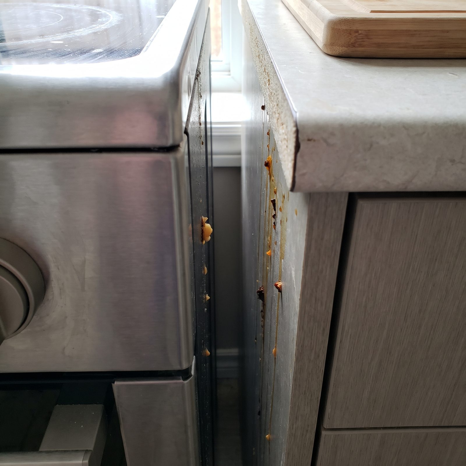 The Gap Between the Stove and Counter, Where Spills Run Down Both Sides