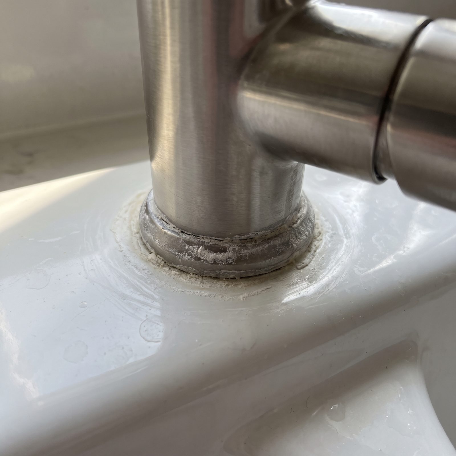 A Mineral Ring Around the Faucet Base Identifies Persistent Splashing