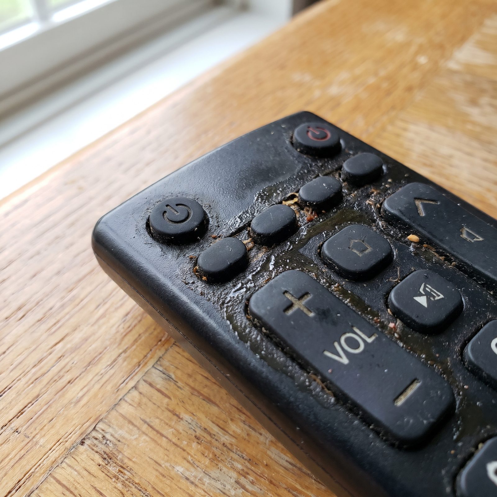 The Seams Around Remote-Control Buttons, a Trap for Skin Oil and Crumbs