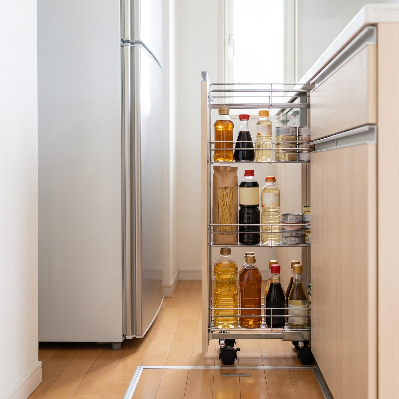 Slide a Wheeled Storage Cart Into the Gap Beside the Refrigerator