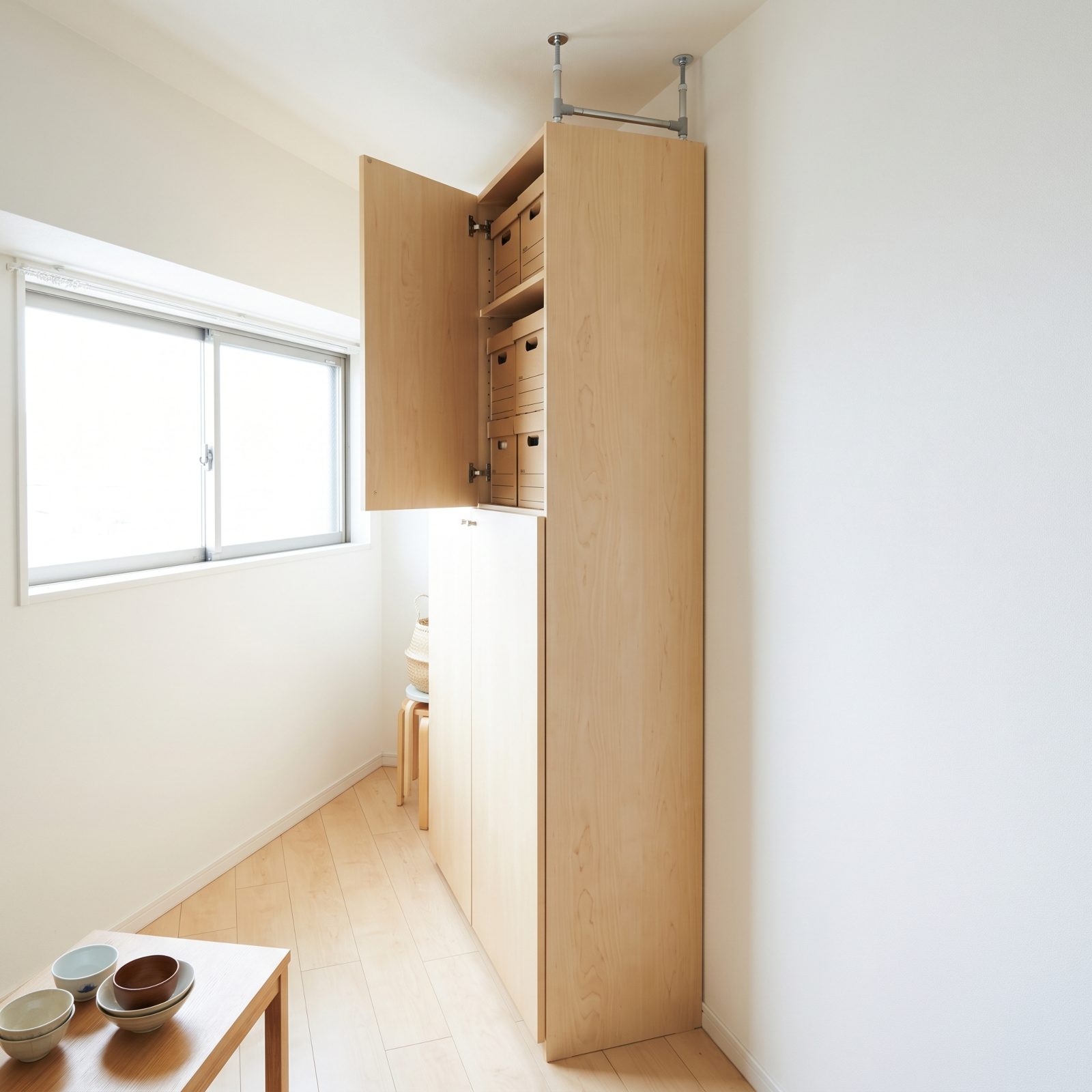 Use a Ceiling-Height Earthquake-Braced Cabinet Instead of a Wide Dresser